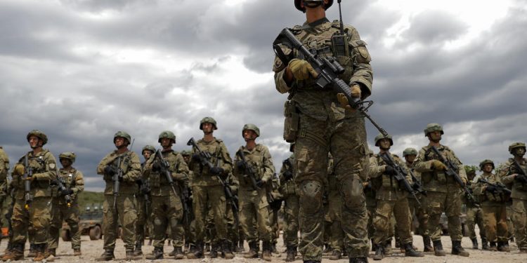 epa09233271 Soldiers of the Kosovo Security Force (KSF) line up following the 'Defender Europe 21' military exercise in the village of Deve, Kosovo, 28 May 2021. Kosovo Security Force joined for the first time the military exercise 'Defender Europe 21' which involves 26 nations, including the US and around 28,000 multinational forces all focused on building operational readiness and interoperability between NATO allies and partners.  EPA-EFE/VALDRIN XHEMAJ